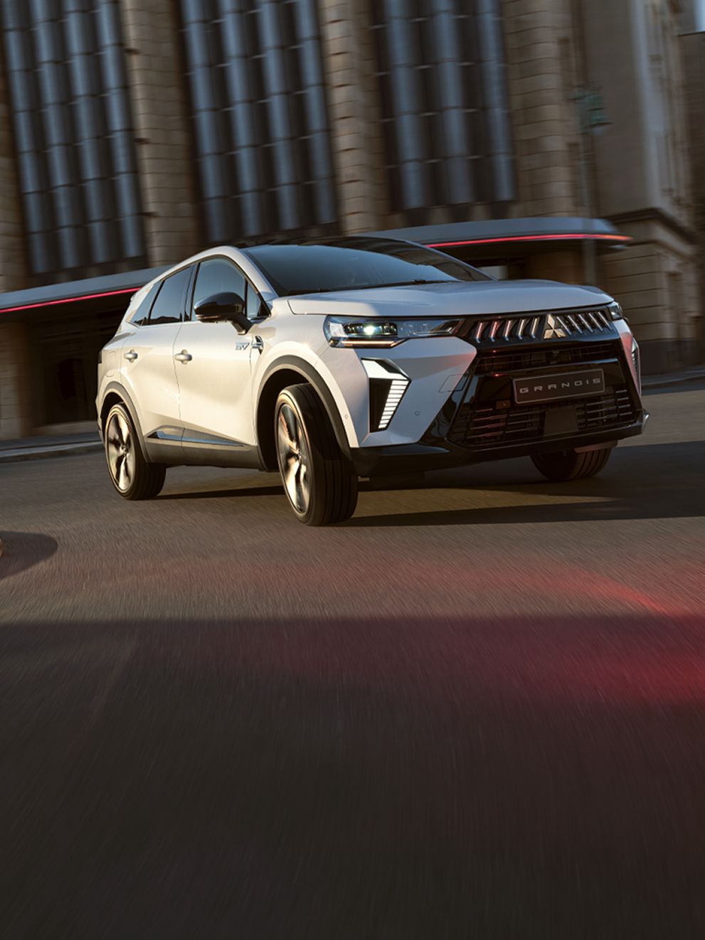 &frac34;-Frontalansicht des fahrendes Grandis