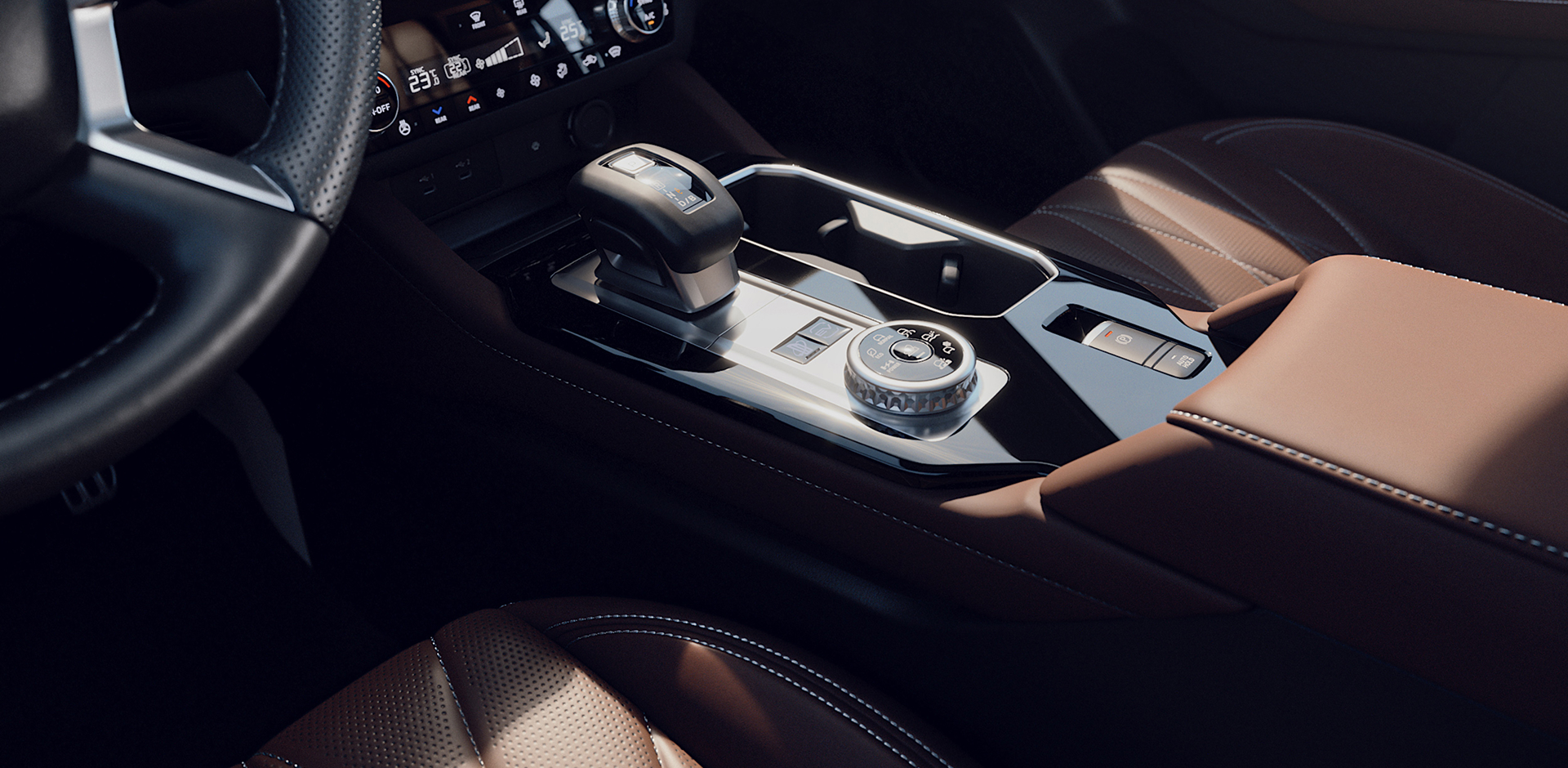 Mittelkonsole des Mitsubishi Outlander mit Getr&auml;nkehalter, Gangwahlhebel und gut sichtbaren Bedienelementen.